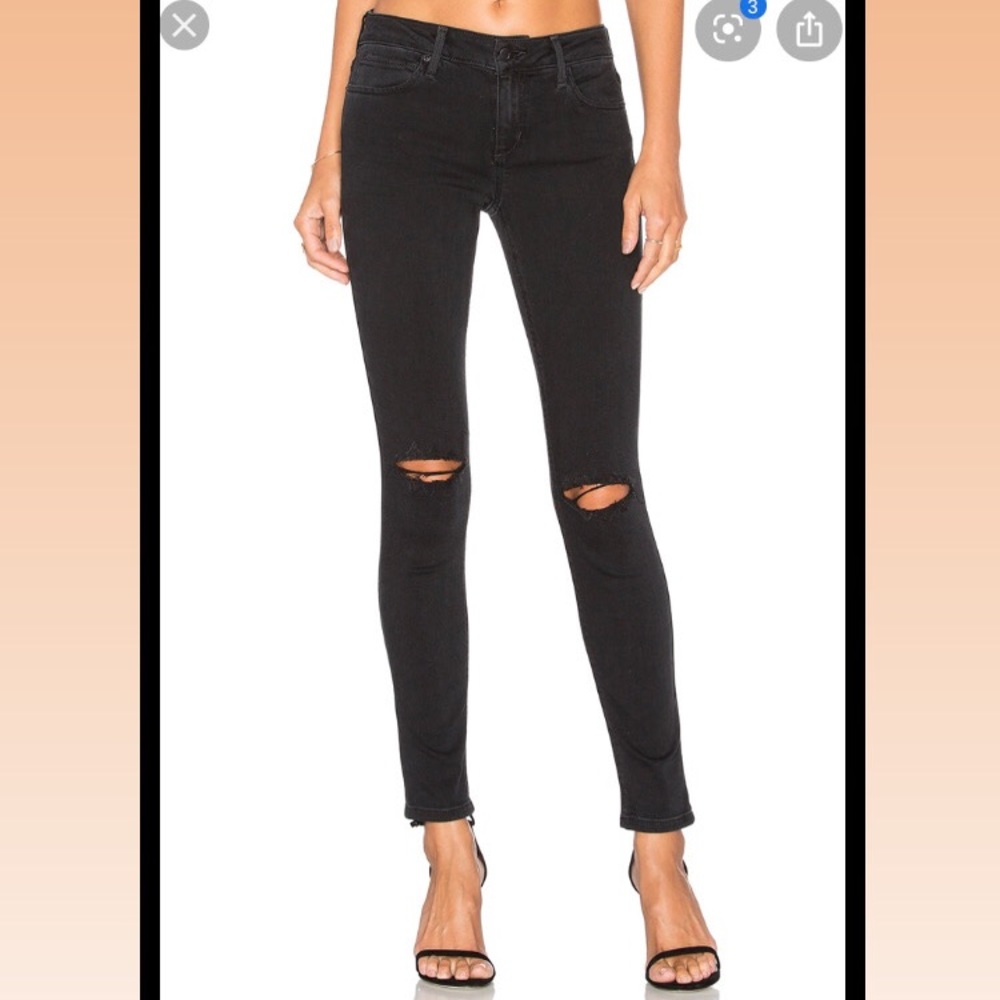 Joes jeans black skinny jeans with knee rips.